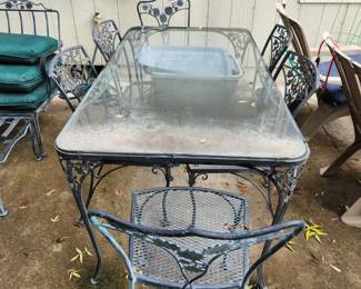 Wrought Iron Table with Glass Top and 6 Wrought Iron Chairs