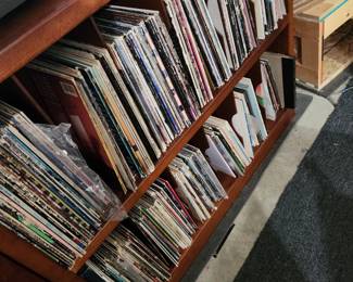 Lots of Vinyl Records - Jazz, Blues, Rock n Roll, 'Crooners', Classical, Western, Movies Scores, etc. Our guy has been a Jimmy Buffet fan so there is many Jimmy records!