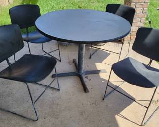 4 Steel Framed Stacking Chairs And Table