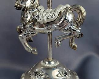Sankyo Silver Toned Music Boxes Including Egg With Hinged Lid And Cross, 6", Carousel Horse Music Box, 8", Plays "My Favorite Things", Works But Needs Repair And Resin Cherubs Figurine, 6.25"