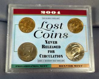 2004 US Uncirculated Lost Coins Including Sacagawea Dollars And Kennedy Half Dollars