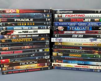 DVD's Including Riddick, Man On Fire, Iron Man, National Lampoon's Loaded Weapon 1 And More, Total Approx Qty 32