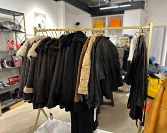 Coats trimmed in fur, leather