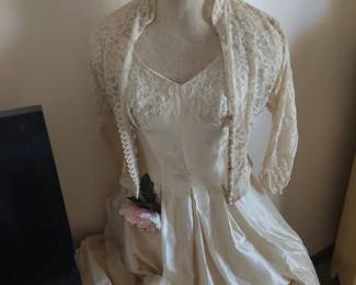 Wedding dress on form and accessories