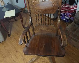 antique wood swivel desk chair with pressed back