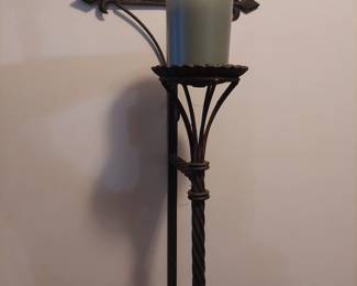 one of a pair of wrought iron wall candle holder