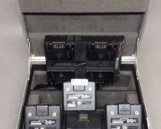 LOT OF 4 ANTON BAUER BATTERIES WITH CHARGER IN CASE