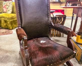 Antique cow hide rocking chair