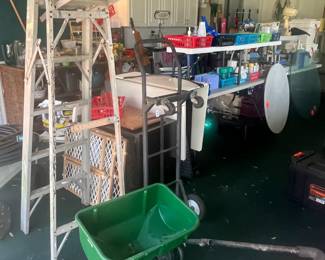 Hand truck, metal ladder, lawn spreader