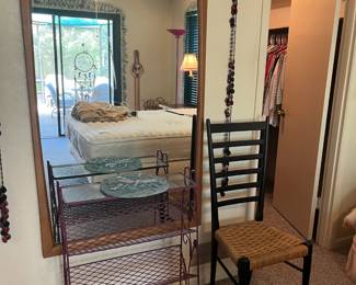 Metal rack, side chair, large wall (or floor) mirror