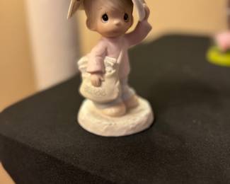 Precious moments  boy with newspaper