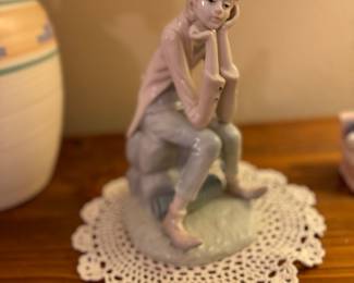 Sad boy with accordion. Lladro style imitation