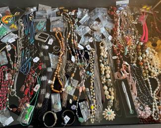 Lots of fun jewelry! Chunky necklaces, wood, beads, shells, watches, earrings, patches, pins, rings etc