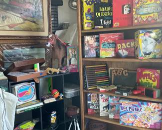 Games!!! Apples to Apples, Kerplunk, Loaded Question, Family Feud, Rack, Twister, Toople, Scattergories, Looney Bin, Pool float, footballs, jump rope, chalk board, teck deck,  books, Barbie doll , horse toy, tri pod, and more!