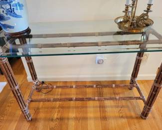A McGuire Bamboo and Glass Console Table. 
