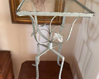 Wrought iron small stand with glass top
