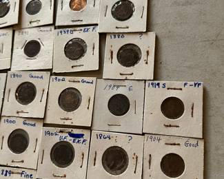 The coins have been removed offsite until days of sale per the families request. 