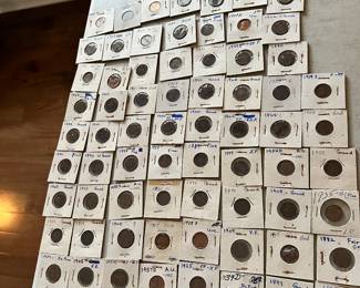 The coins have been removed offsite until days of sale per the families request. 