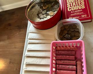 The coins have been removed offsite until days of sale per the families request. 