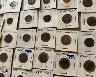 The coins have been removed offsite until days of sale per the families request. 
