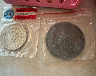 The coins have been removed offsite until days of sale per the families request. 