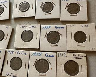 The coins have been removed offsite until days of sale per the families request. 