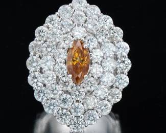 Fancy Color 1.58 Carat Diamond in a 14.25 Carat Diamond Ring