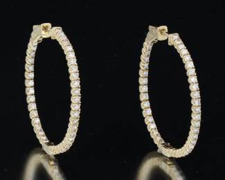 A Pair of Diamond Hoop Earrings