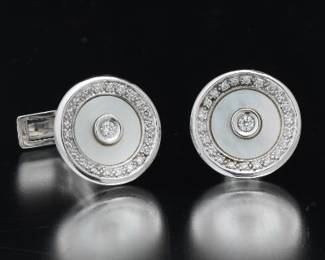 A Pair of Gold and Diamond Cufflinks