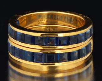 A Pair of Gold and Blue Gemstone Bands