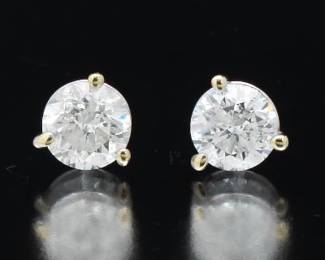 A Pair of Diamond Stud Earrings