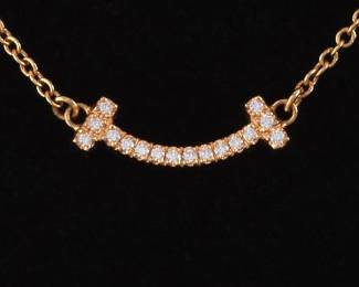 Tiffany Co. T Mini Smile Gold and Diamond Adjustable Necklace