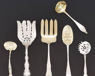A Collection of Sterling Silver Serving Utensils, Including George II Berry Spoon