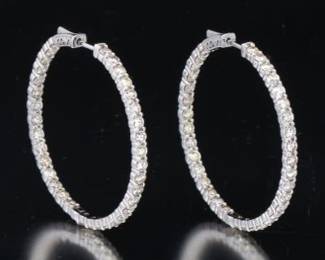 A Pair of 6.34 Carat Diamond Earrings