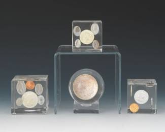 Four Acrylic Paperweights with Silver Coins