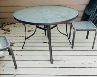 Glass top patio table with two glass top end tables