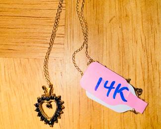 14 K necklace with heart shaped sapphire pendant