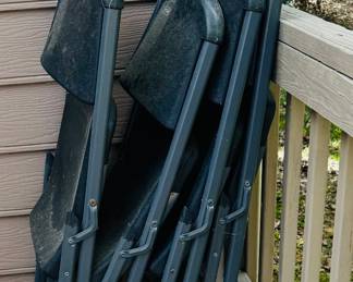 Set a four heavy duty, plastic lifetime folding chairs