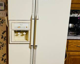 Whirlpool side-by-side refrigerator freezer