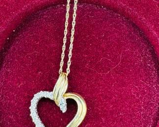 14 K necklace with heart-shaped diamond pendant