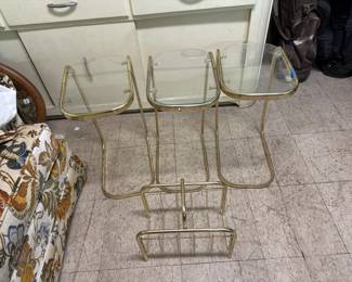 Lot 325 | Three Glass Side Tables and Magazine Rack
