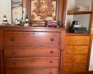 Nice antique dresser, lighthouses, and artwork