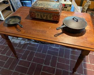 Wooden table and cast-iron