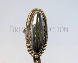 HEMATITE AND STERLING NAVAJO RING (1) LARGE STERLING SILVER NAVAJO RING WITH A LARGE HEMATITE STONE. STAMPED "STERLIN...
