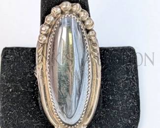 HEMATITE AND STERLING NAVAJO RING (1) LARGE STERLING SILVER NAVAJO RING WITH A LARGE HEMATITE STONE. STAMPED "STERLIN...
