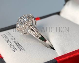 DIAMOND AND STERLING RING & EARRINGS SET (1) STERLING SILVER AND DIAMOND RING. 1/10 CTW WITH I-J/13 CLARITY. SIZE 7 *RETAIL...