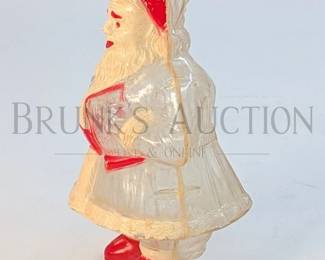 1930'S TRANSLUCENT CELLULOID SANTA BANK 6.25" T * MISSING SOMETHING IN HAND AND COIN DOOR *