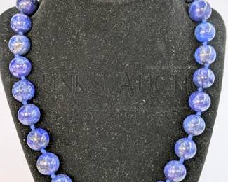 LARGE LAPIS LAZULI BEAD NECKLACE (1) LARGE BEAD NECKLACE MADE OF LAPIS LAZULI AND A SILVERY BUTTERFLY CLASP. 21"