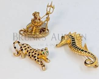(3) DESIGNER FASHION BROACHES (1) ENAMELED SEAHORSE BROACH BY "GERRYS". 3" (1) CARTOON NEPTUNE BROACH. 2.25" (1) JOSEPH...