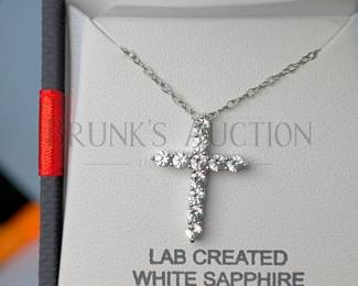 SAPPHIRE AND STERLING CROSS NECKLACE & EARRINGS (1) WHITE SAPPHIRE AND STERLING SILVER CROSS PENDANT NECKLACE. 18"...